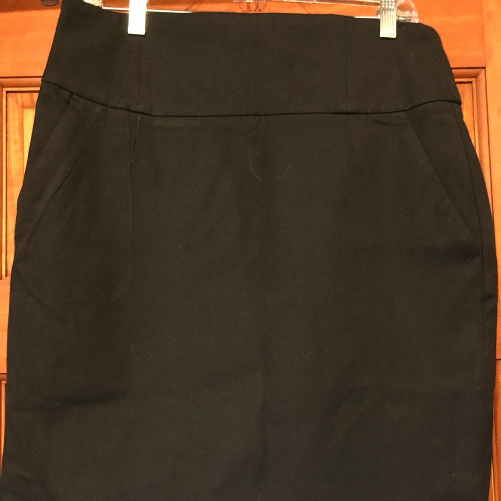 Black stretch skirt midi length